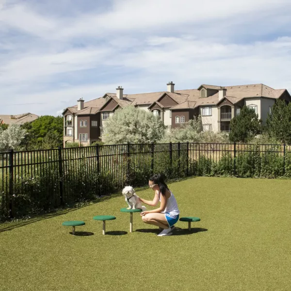 Apartment community off-leash dog park at Griffis Belleview Station in Denver, Colorado.