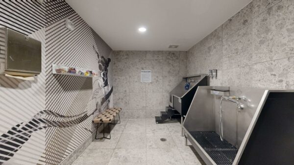 Virtual tour thumbnail for Griffis at Fiddler's Green pet washing station.
