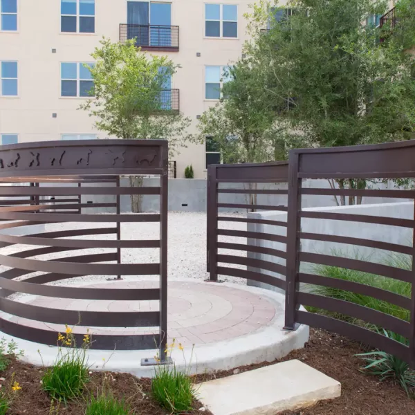 Apartment community off-leash dog park at Griffis at The Domain in Austin, Texas.