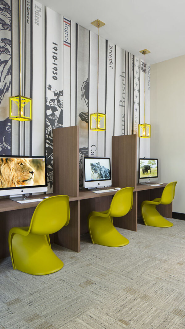 Apartment community business center with MAC work station at Griffis Belleview Station in Denver, Colorado.