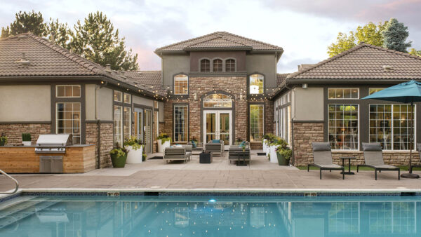 Apartment community resort-style pool + all-season spa at Griffis Belleview Station in Denver, Colorado.