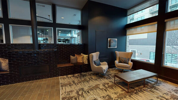 Virtual tour thumbnail for Griffis Cherry Creek entertainment room and resident lounge.
