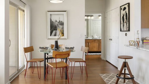 Apartment Dining room with wood floors.