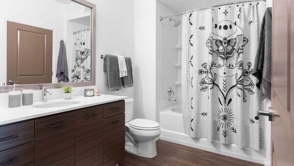 Bathroom with Large Soaking Tub and Wood-Style Flooring.