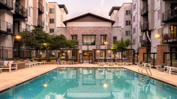 Apartment community resort style pool + cabanas at Griffis Lake Washington in Renton, Washington.