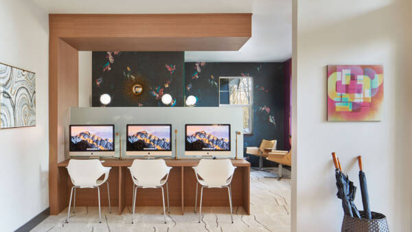 Apartment community business center with MAC working station at Griffis North Creek in Bothell, Washington.