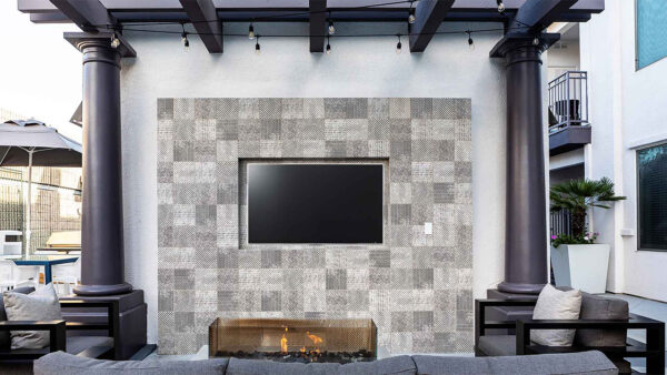 Apartment community outdoor fire pit at Griffis Pine Ave in Long Beach, California.