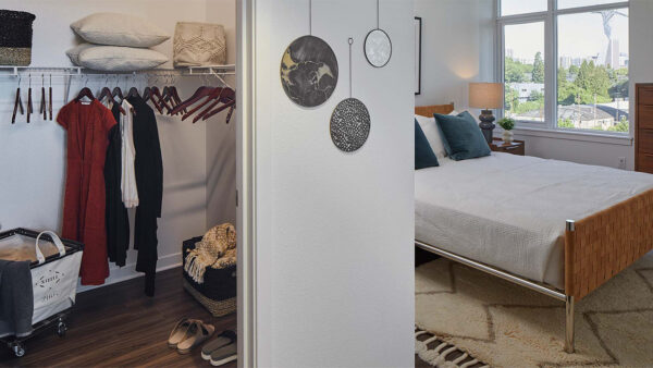 Spacious apartment bedroom with large closet and wood-style flooring.