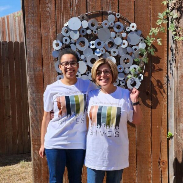 Griffis Residential employees posing together outside.