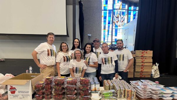 Group of Griffis employees volunteering at food bank.