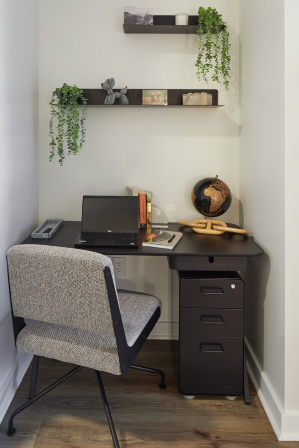 Desk with wood-style flooring.