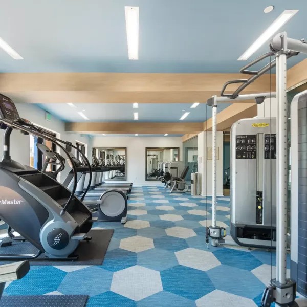Apartment community 24-hour fitness center at Griffis South Bay in Milpitas, California.