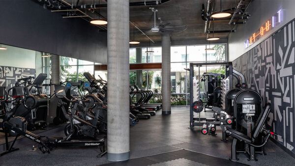 Apartment community 24-hour fitness center at Griffis East Village in San Diego, California.