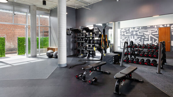 Apartment community 24-hour fitness center at Griffis East Village in San Diego, California.