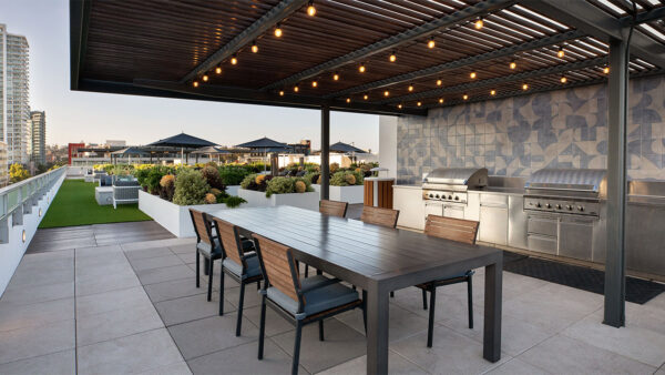 Apartment community outdoor grilling stations at Griffis East Village in San Diego, California.