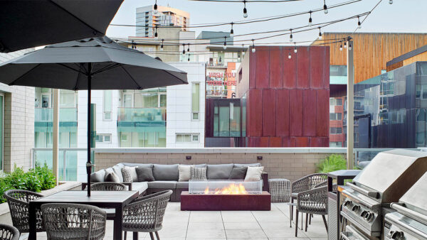 Apartment community outdoor lounge and fire pit at Griffis LoDo in Denver, Colorado.