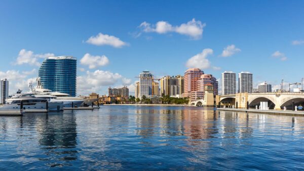City skyline, waterfront boats, and the Royal Park Bridge in West Palm Beach, Florida.