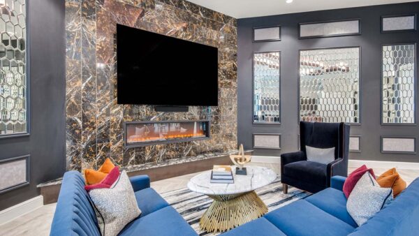 Griffis Frisco resident lounge with fireplace.