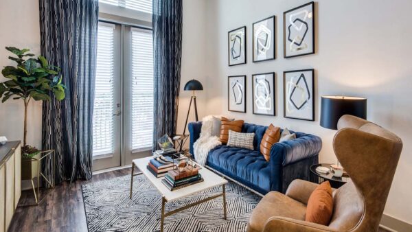 Griffis Frisco apartment living room with wood style floor.