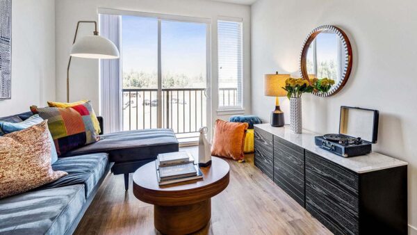 Griffis Shoreline apartment living room with wood style floor.