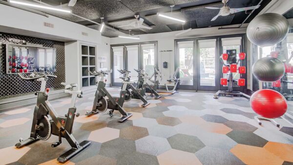 Griffis Uptown fitness center with spin bikes.