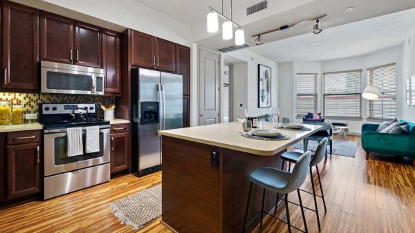 Griffis Uptown apartment kitchen with stainless steel appliances.