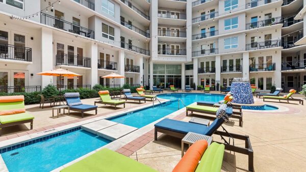 Griffis Uptown resort-style pool area with lounge chairs.