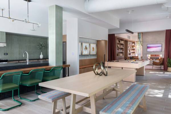 Griffis at The Domain community resident lounge with pool table.