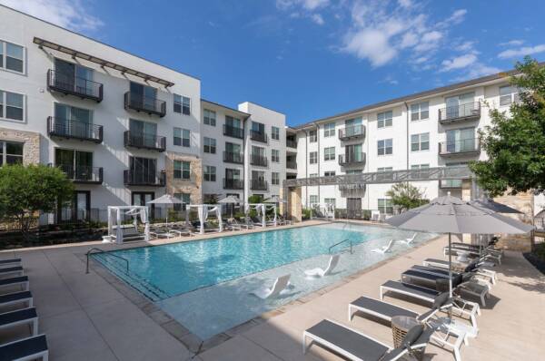 Griffis at The Domain community pool.