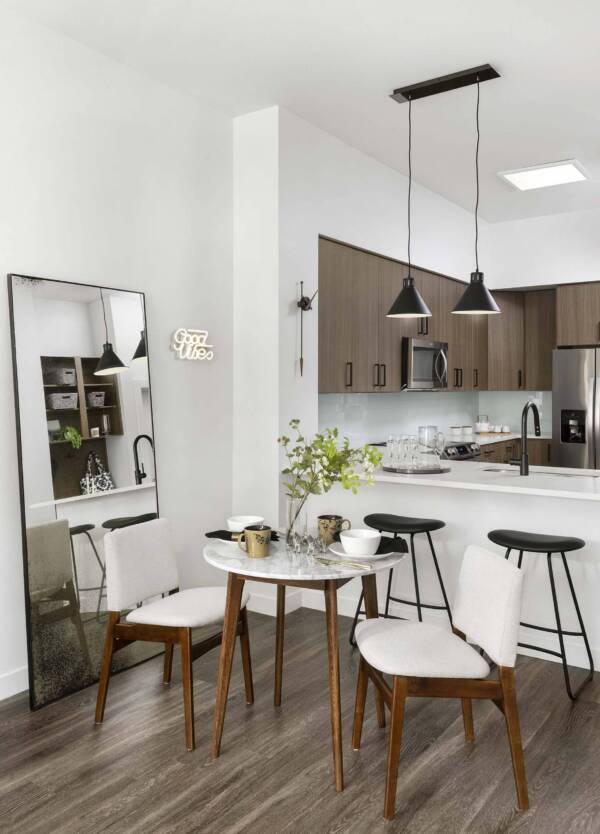 Griffis Cherry Creek North apartment dining room with wood style floor.