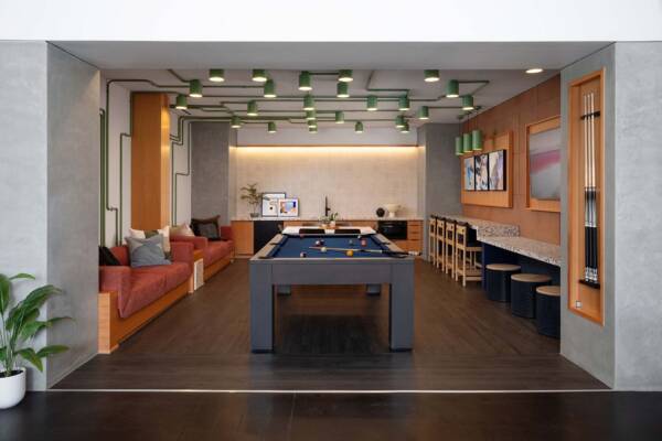 Griffis East Village apartment community entertainment lounge with pool table in San Diego, CA.