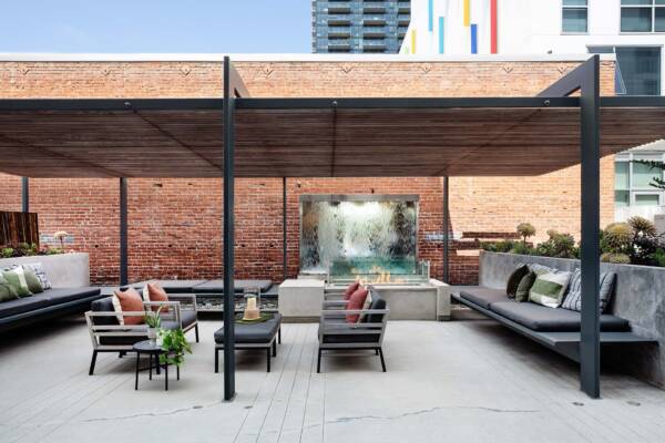 Griffis East Village apartment community outdoor lounge with fire pit in San Diego, CA..