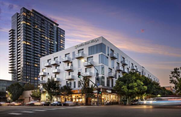 Griffis East Village apartment community exterior at dusk in San Diego, CA.